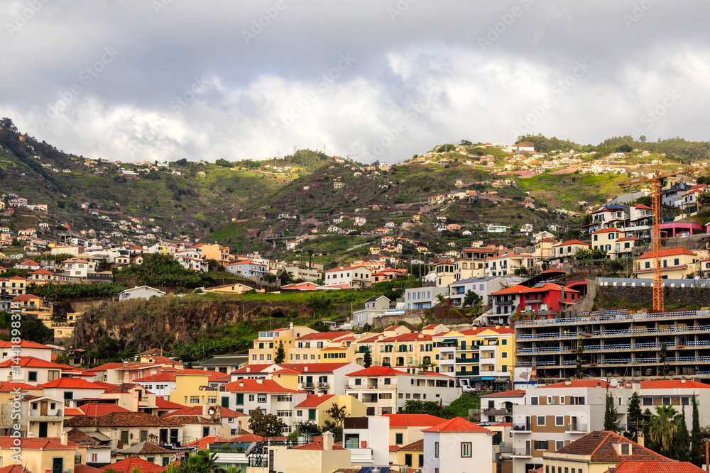 Panorama of village Camara de Lobos in cloudy day in Madeira, Portugal