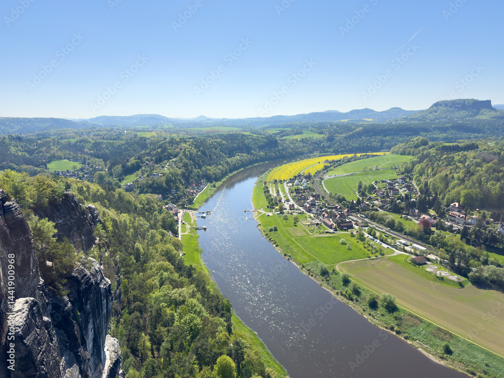 aerial view of rural village rathen in the elbe sandstone mountains in east germany with the river elbe from the bastei area