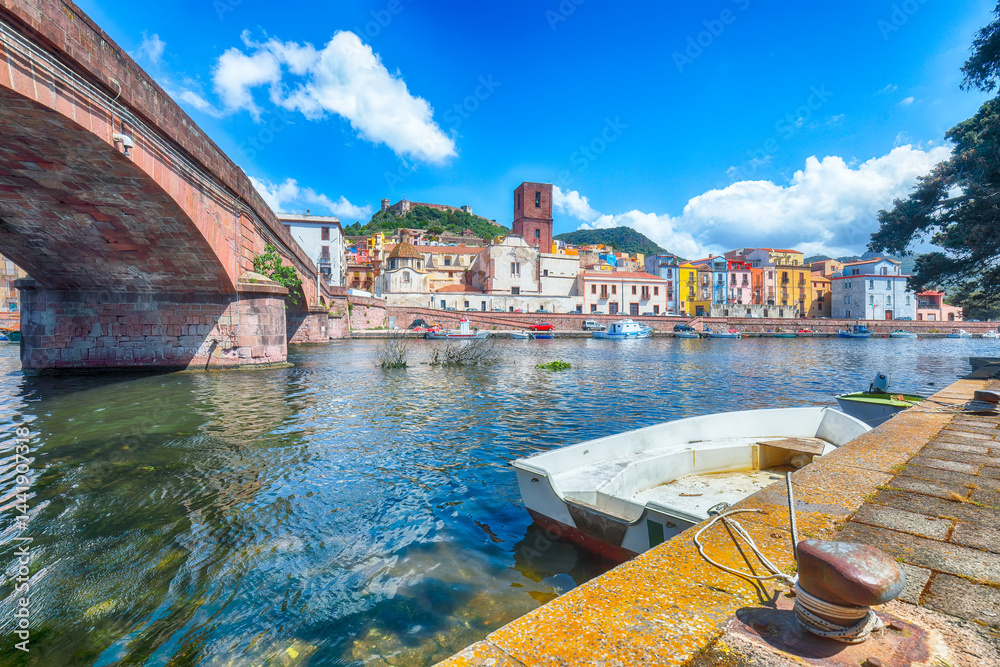 Attractive cityscape of Bosa town with Ponte Vecchio bridge across the Temo river.
