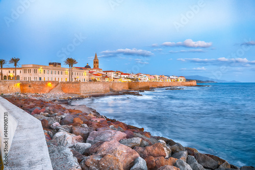 Amazing evening cityscape of historical part of Alghero town.