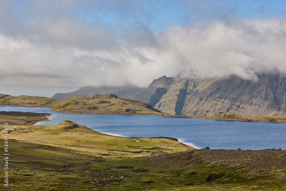 Lake coastline scenery in Lonsvik area. East fjords. Iceland