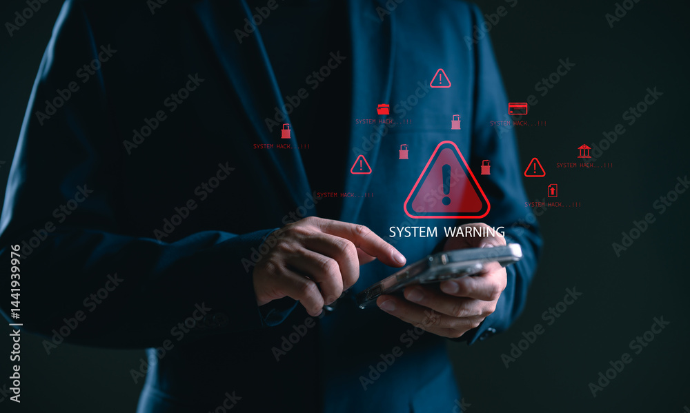 Businessman using smartphone facing system warning and cyber attack alert, representing cybersecurity risk, hacking threat, data breach, information security, and digital protection concerns.