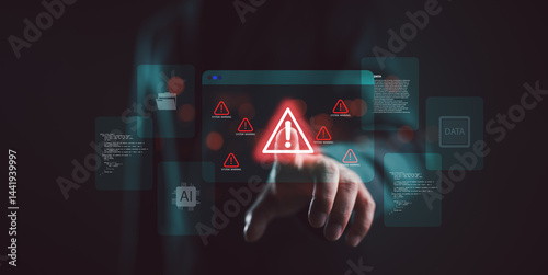 System warning alert on virtual interface with hand interaction. Concept of cybersecurity risk, data breach, malware, hacking, IT failure, and digital system vulnerability in modern technology. photo