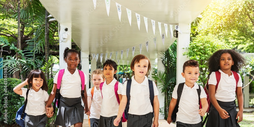 Naklejka premium Back to school. Diverse students with backpacks, boys and girls. Group of students ready for school with backpacks. Back to school with students and backpacks. Back view of diverse students at school