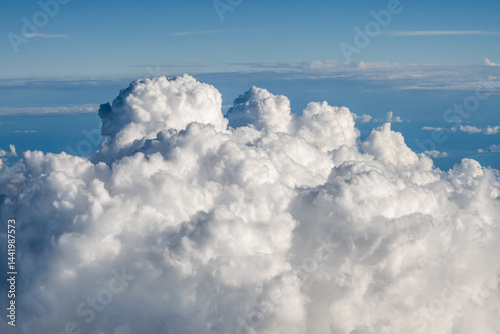 Aerial cloudscaspe picturesque clouds and sky from top view over the horizon