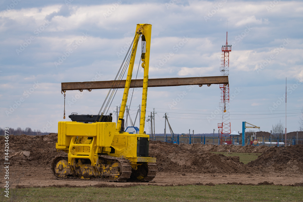 construction equipment on the section of the highway, laying of an underground gas pipeline