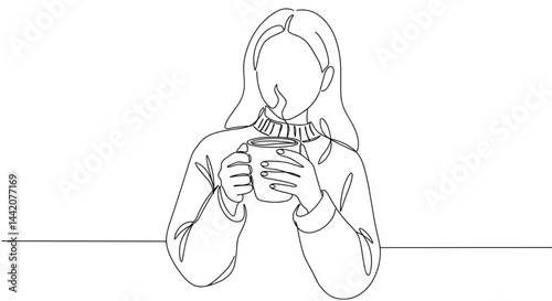 Obraz na płótnie Woman enjoying a warm drink sitting at a table in a minimalist style w salonie
