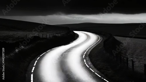 Winding Road Under Dark Stormy Sky