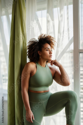 Portrait of plus size female model in activewear i the yoga studio Free Download Portrait of plus size female model in activewear i the yoga studio - GFXLoad