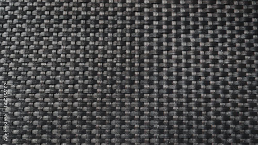 black panoramic background with rattan weave texture black panoramic background with rattan weave texture