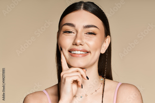 Εκτύπωση καμβά Young woman enjoying summer glow with a radiant smile and sun-kissed skin
