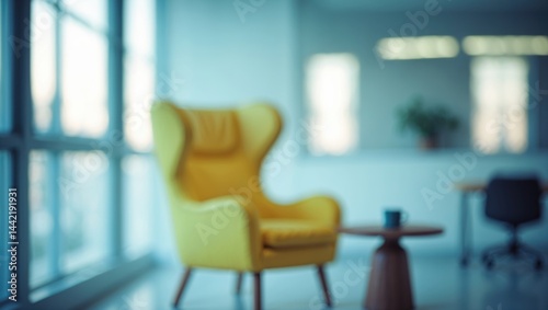 Background usage of a blurred office room image with table and chairs