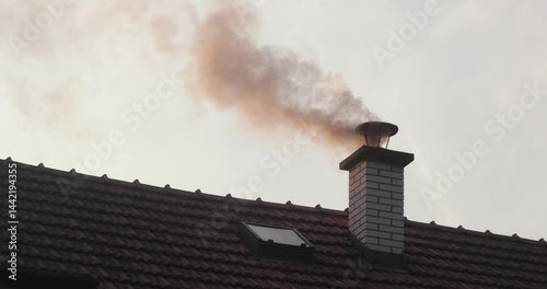 Smoking Chimney on a Roof