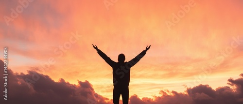 Person with arms up to sky