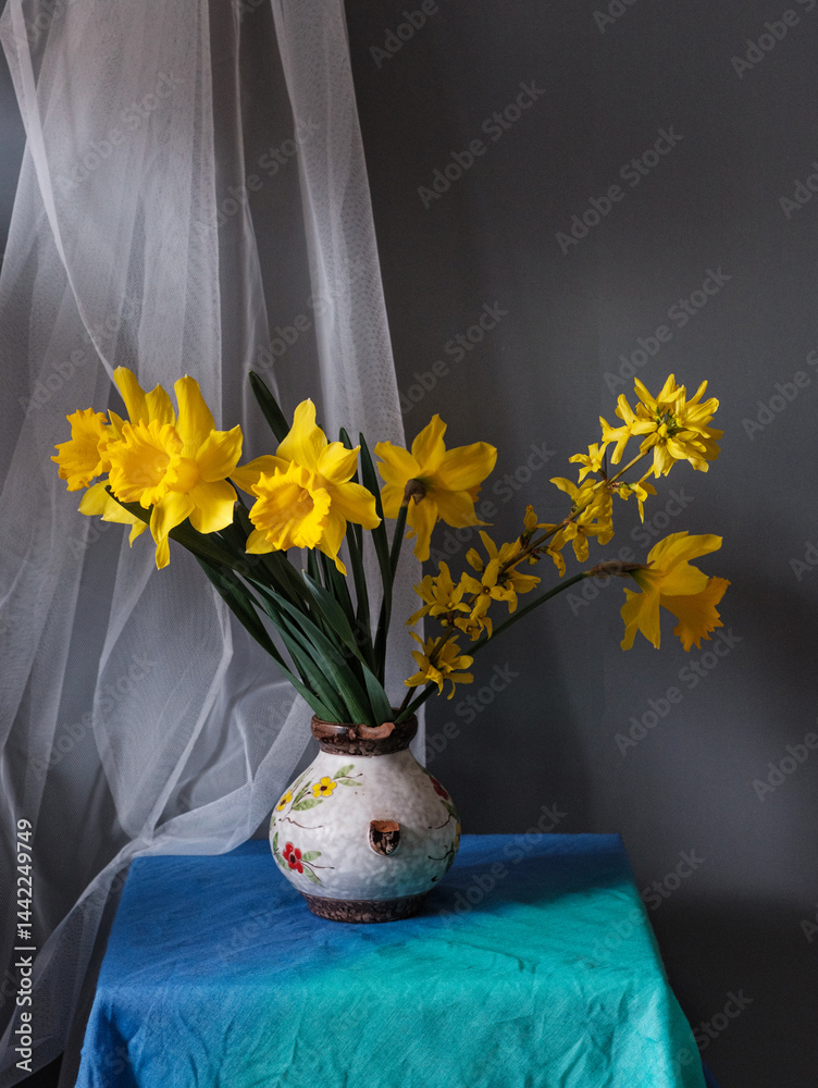 A stunning display of vibrant yellow flowers beautifully arranged in a vintage pitcher