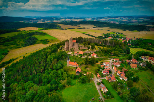 Obraz na płótnie Stunning Aerial View of a Magnificent Ancient Castle Enveloped by Verdant Lush Landscapes. Hanstein castle, Germany. w salonie