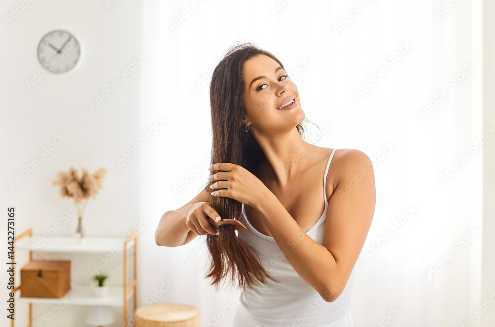 Naklejka premium Young smiling beautiful woman brushing long healthy brunette hair, happy female doing morning beauty care hairstyle, restoration mask, haircare at home, natural beauty model hairbrush preparation