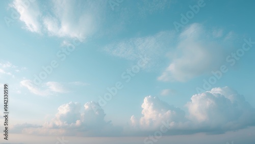 Light blue sky filled with clouds