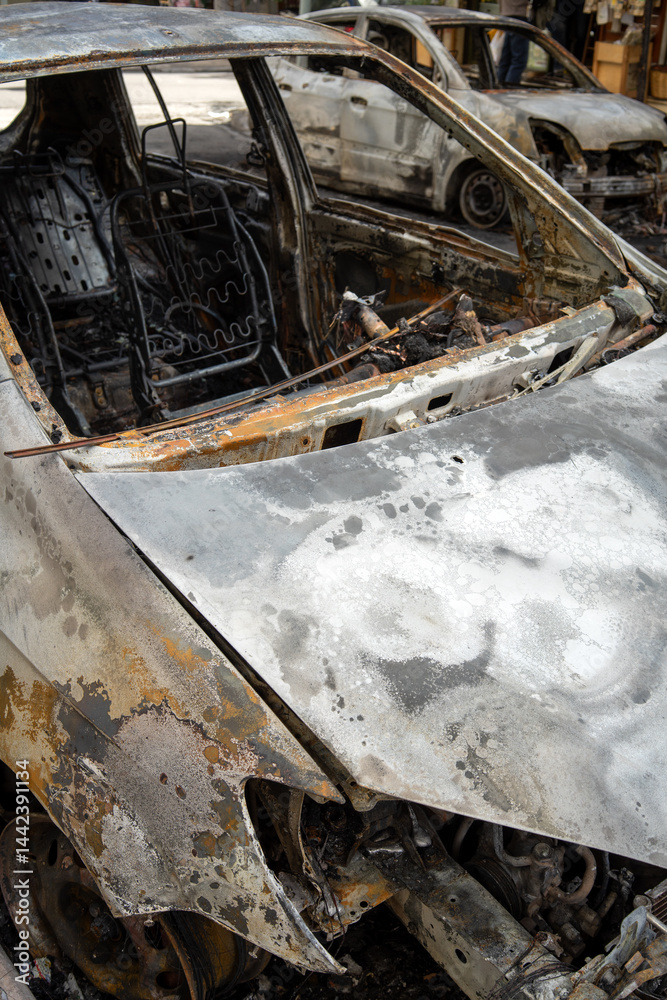 Burnt car in Eksarchia district after clashes between anarchists and the police.
