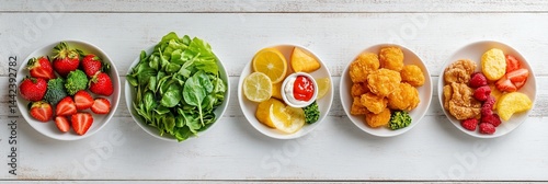 Obraz na płótnie Five bowls of healthy and unhealthy food. Strawberries, broccoli, lettuce, lemon, pineapple, breaded chicken nuggets, and raspberry. w salonie