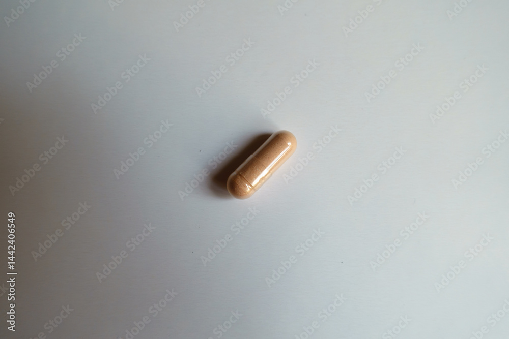 1 pink capsule of palmitoylethanolamide dietary supplement from above