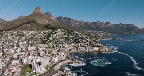Spectacular tilt-up view of the popular tourist destination Cape Town. Table Mountain,Lion's Head mountain, The 12 Apostles mountain range, Seapoint, Camps Bay,Cape Town, South Africa