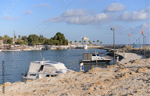 Boats and yachts on the shore of the ancient city of Side, Turkey