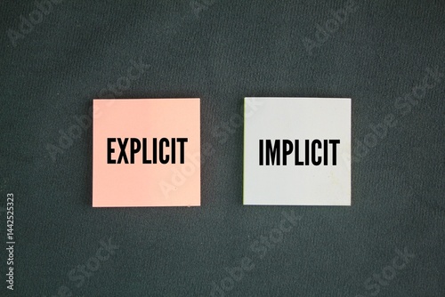 Photography Colored paper with the words explicit and implicit