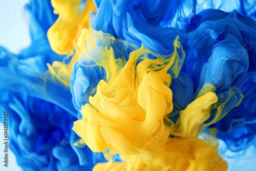 Vibrant mix of swirling blue and yellow liquids.