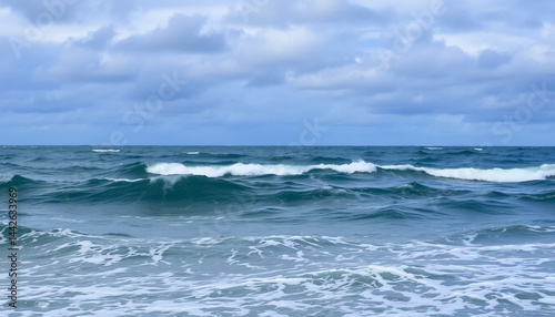 Rolling Ocean Waves Under a Cloudy Sky