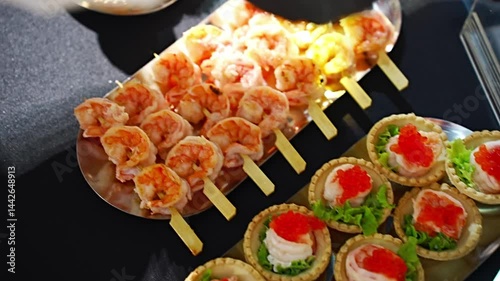 Delicious shrimp appetizers served at a festive gathering in the evening