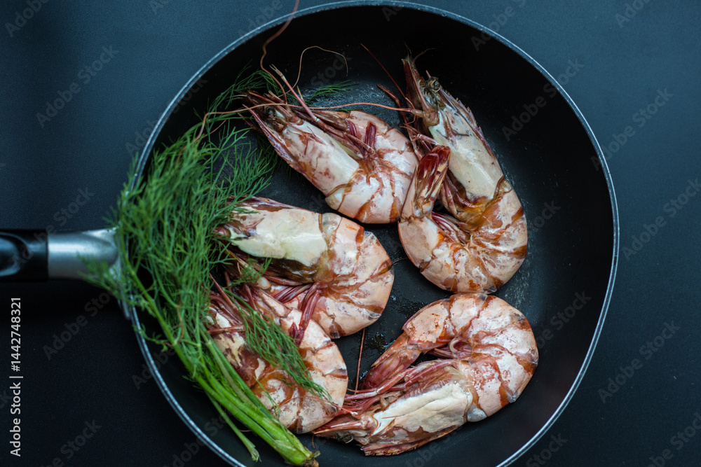 Sea giant shrimp grilled in black pan with vegetable spicy seafood grilled