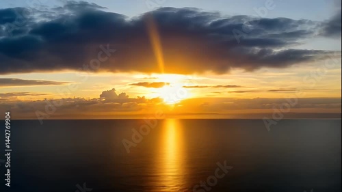 Golden Sunset Over Calm Ocean Waters