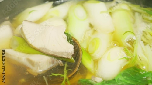 One-pot dish with yellowtail, leeks, and many other vegetables