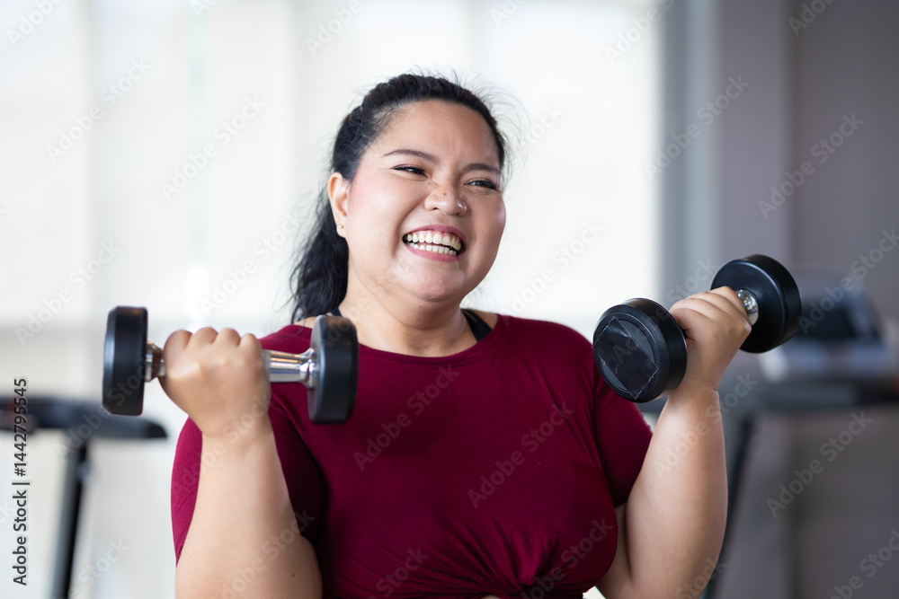 Portrait woman Exercise. beautiful young chubby overweight woman wearing sporty fitness clothes doing exercise indoors at gym fitness sport club, body and health care
