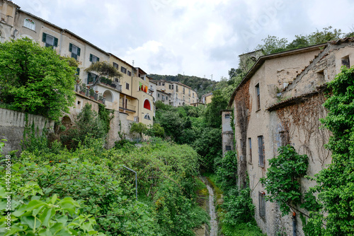 Obraz na płótnie Old houses in the green vegetation in pIedimonte Matese, a town in Campania in Italy. w salonie