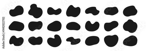 Irregular black blobs. Modern freeform liquid elements, amoeba shapes collection.