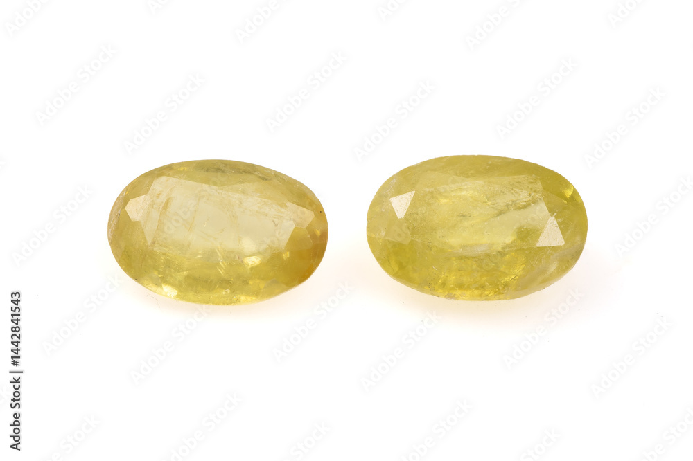 Natural Golden Yellow Faceted Oval Sphene Gemstones on White Background