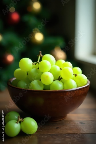 Juicy green grapes in rustic bowl, Christmas tree backdrop, still life, food, table