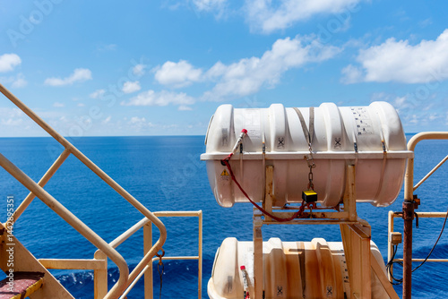 Close-up of a life rafts mounted on a merchant vessel, essential life-saving equipment for the crew in case of emergency evacuation at sea.