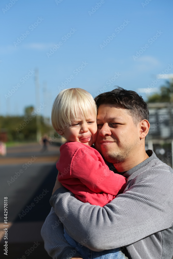 Fototapeta premium Father and toddler son spending time together outdoors
