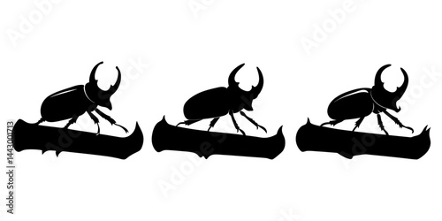 Rhinoceros beetle silhouette on a log.