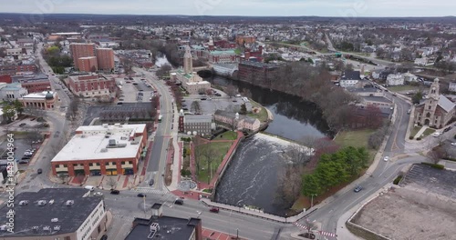 Pawtucket RI, USA - April 5, 2025:  Aerial video of the Pawtucket City Hall, Old Slater Mill National Historic Landmark on the Blackstone River.
