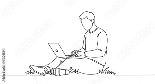 Man sitting with laptop working in a grass field  