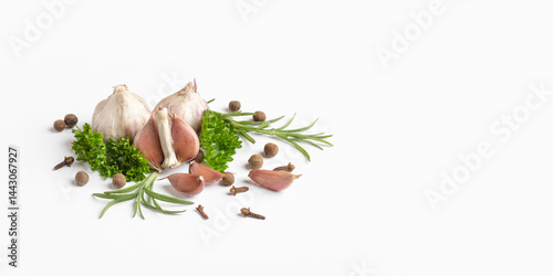 Fototapeta Naklejka Na Ścianę i Meble -  Spices rosemary sprigs, garlic, parsley and black pepper peas on a white background. Concept of healthy eating, cooking