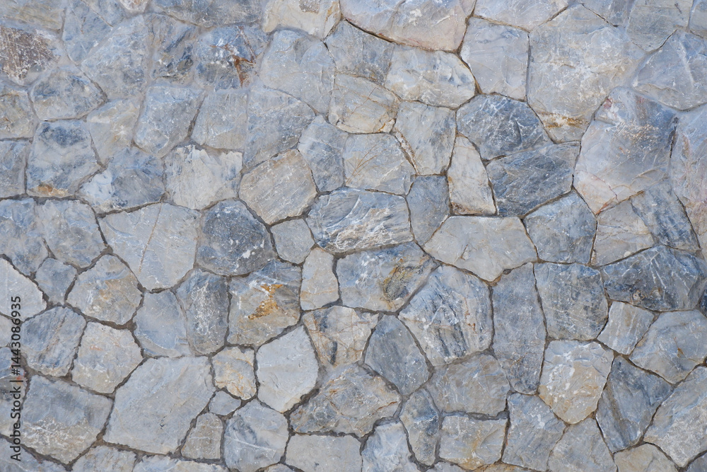 Close up Texture of a stone wall and wooden wall,Background of stone wall texture,grunge stone wall background. Close up Texture of a stone wall and wooden wall,Background of stone wall texture,grunge stone wall background.