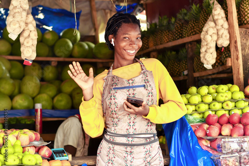 fruit sales person welcoming returning customer