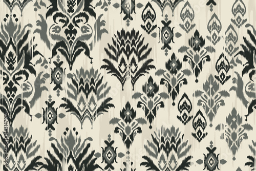 Monochrome grey black ikat seamless pattern, ethnic traditional textile design, abstract tribal background for wallpaper, fabric, wrapping paper, fashion and digital prints