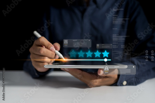 Businessman using digital tablet marketing approach focuses on client experience, feedback analysis, and quality improvement for achieving 5 satisfaction rating in business service