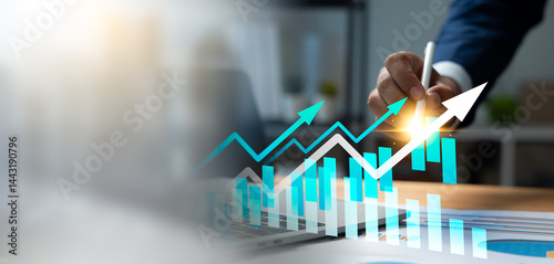 Businessman using tablet and laptop to review business data analysis report and performance indicator dashboard. Strategic planning,Economic growth insights guide market research and decision making